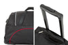 Detailopname van de handgreep en het telescopische handvat van de trolleytas uit de kofferbaktassen Tesla Model Y Juniper 2025+ set.