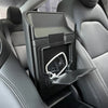 Deze tesla model y organizer toont een opbergvak met kabels en accessoires, netjes weggewerkt onder de armsteun in de Model Y Juniper 2025+.
